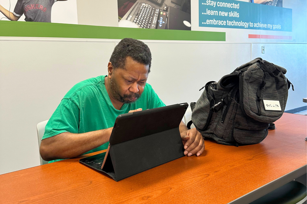 Male client using an iPad