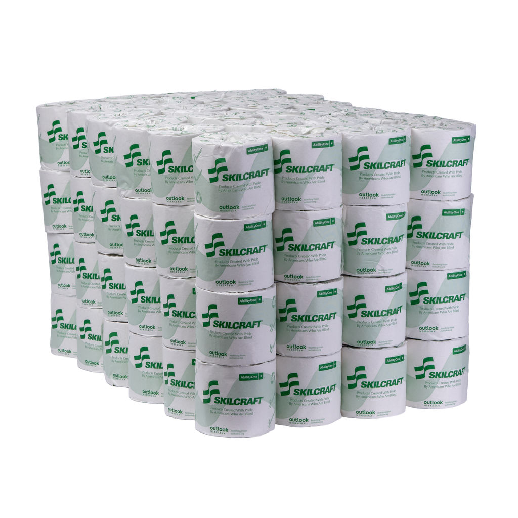 Standard roll tissue, 1-ply, stacked in a display, featuring SKILCRAFT branding, made from 100% recycled fiber, emphasizing eco-friendly bathroom tissue attributes.