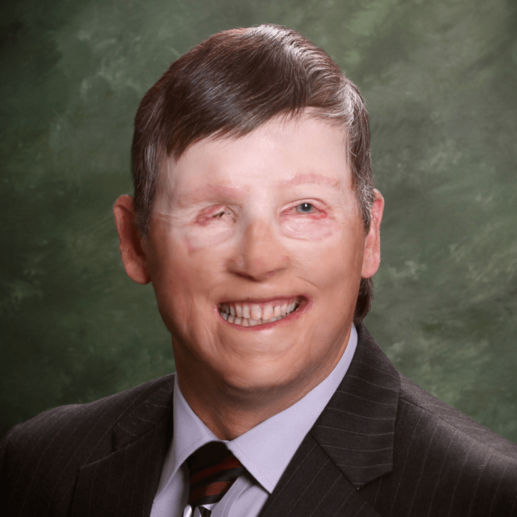 Smiling headshot of Human Resources Director, Mark Plutschak