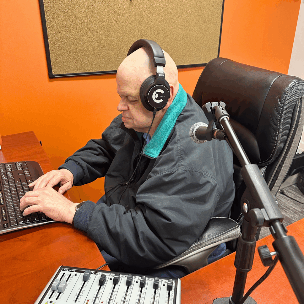 Dennis editing in the studio for Outlook On-Air.