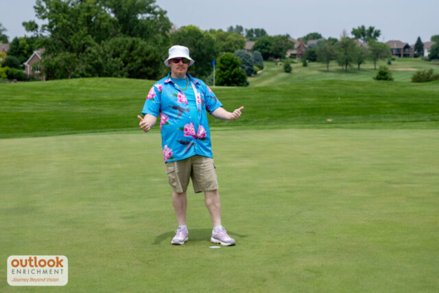 Outlook associate Josh smiling for a photo.