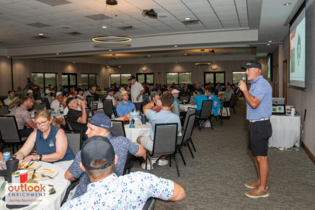 Eric speaking to the crowd at the banquet.