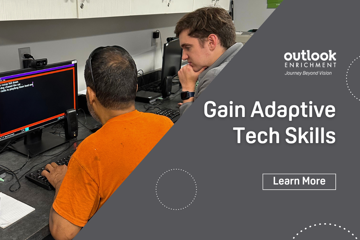 Outlook trainer, Isaac, works with a male client on computer typing skills.