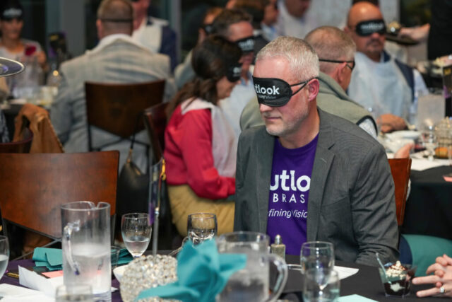 Eric wearing sleep shades.